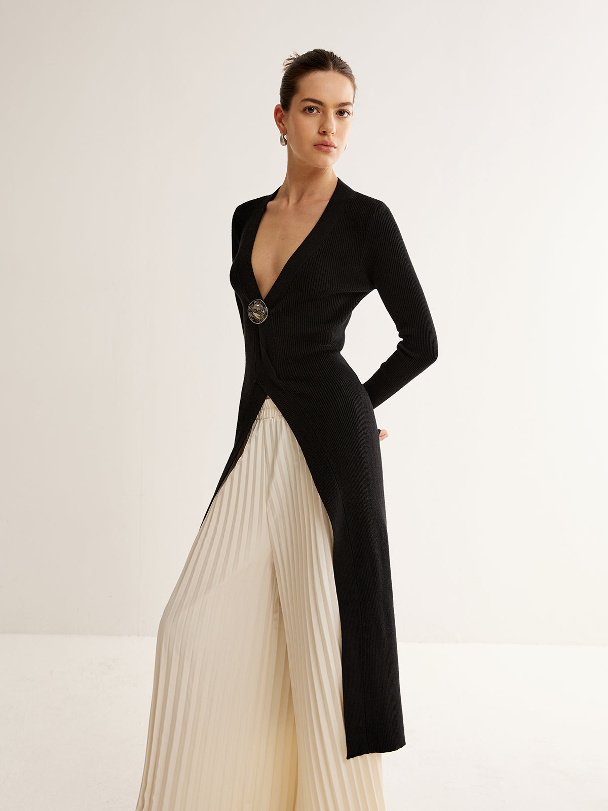 Metal Detaylı Yırtmaçlı Triko Uzun Bluz