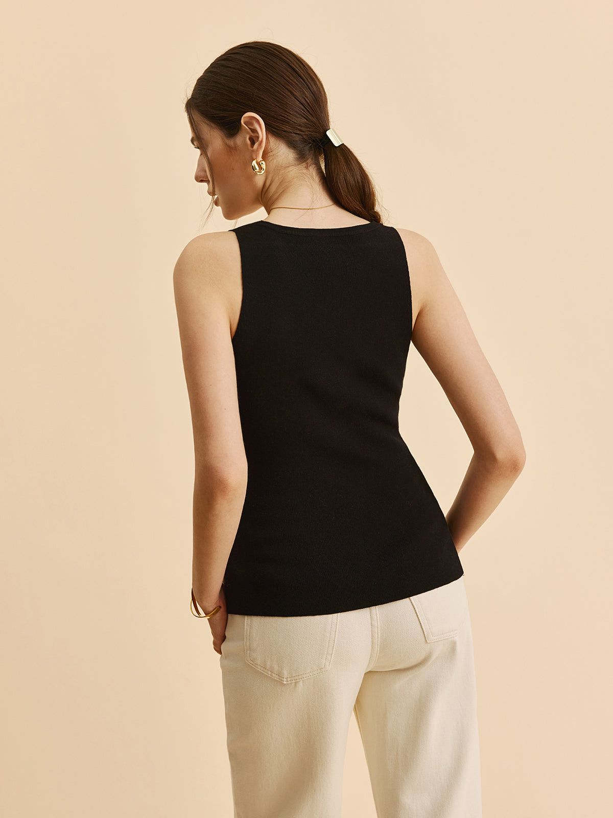 Kıvrımlı Kenar Detaylı Yırtmaçlı Triko Yelek